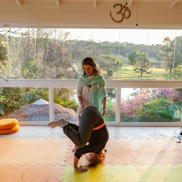 Woman in a calm yoga pose symbolizing harmony and balance.